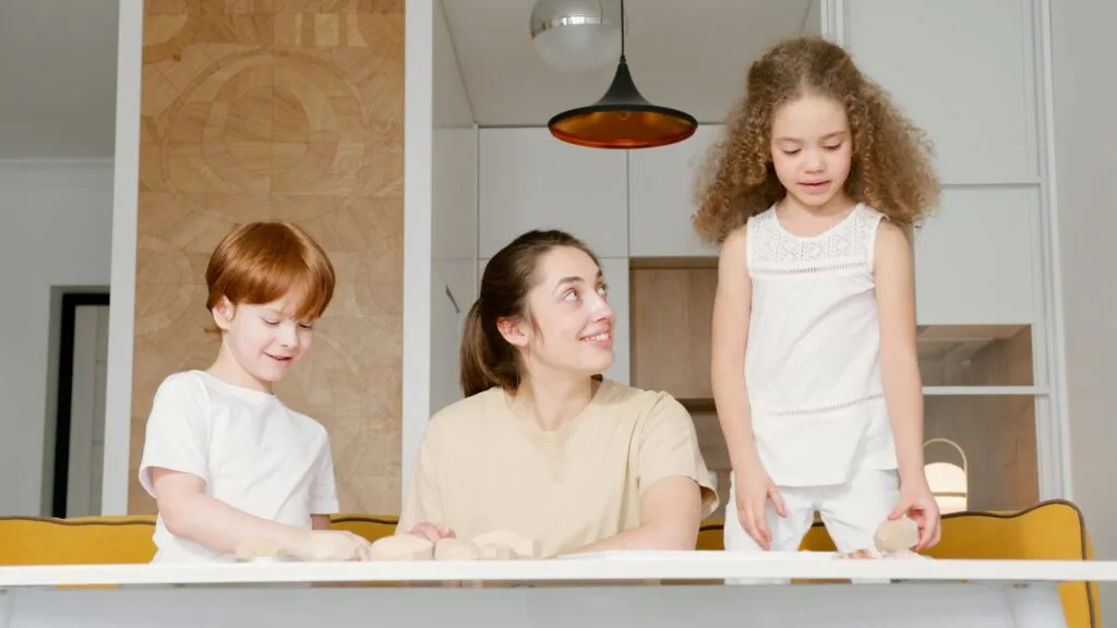 A millennial mom and her Gen Alpha kids.