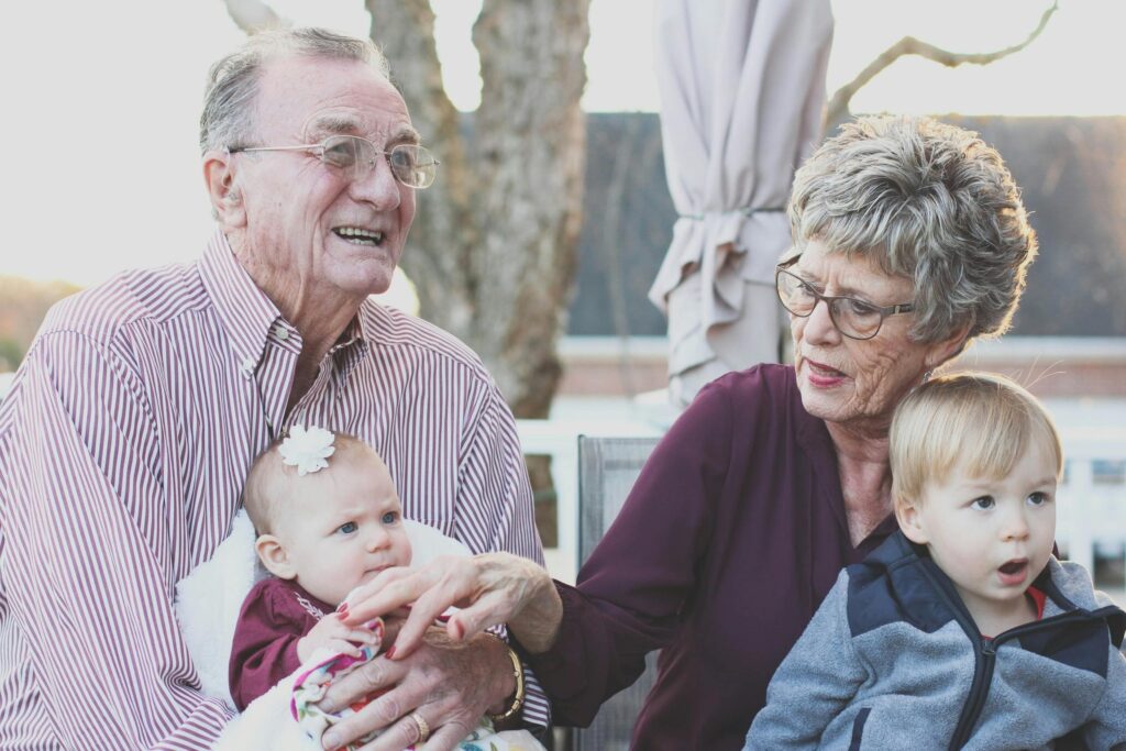 two members of the silent generation with their grandchildren